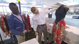 Patrick and David admire their wetsuit kimono